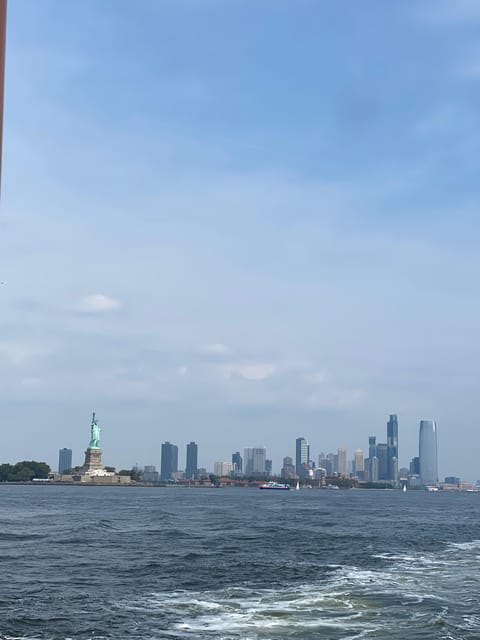 #1 Six Hour Bus Tour and Boat Ride By The Statue of Liberty - Brooklyn Bridge area and City Hall views without the marathon