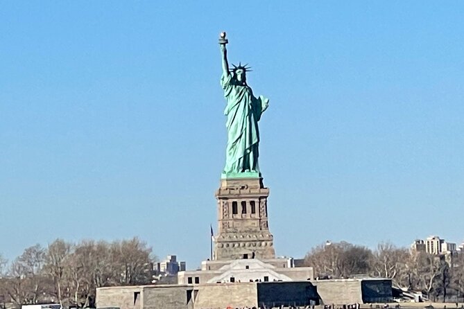 6 hour Bus tour and 1 hour Boat Ride by the Statue of Liberty - National 9/11 Memorial and Museum Question: You Get the Walk, Not the Museum