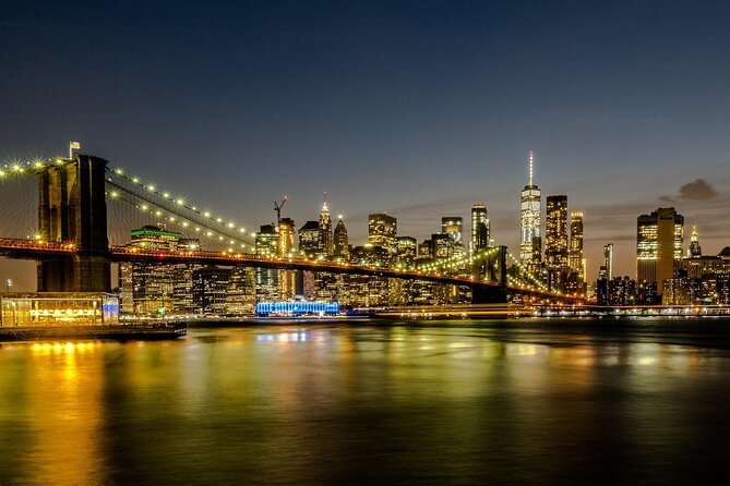 60-minute Sunset Skyline Cruise around Statue of Liberty - Past Ellis Island, under the Brooklyn Bridge: the route’s best moments