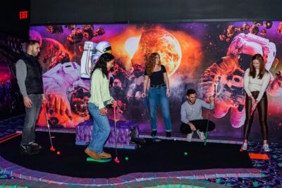American Dream Black Light Indoor Mini Golf Ticket - Neon photos and the sci-fi theme: why it’s more than just mini golf