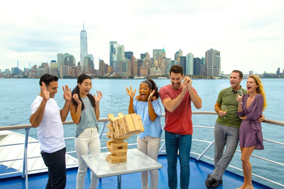 City Cruises New Jersey: NYC Buffet Lunch or Dinner Cruise - Your dining setup: reserved table, buffet courses, and balcony-style views