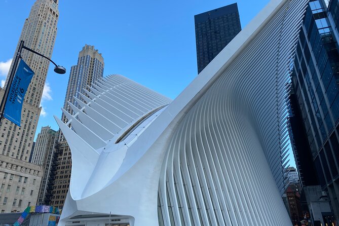 French Tour of South Manhattan - Stop 2: The 9/11 Memorial Area, One World, and Brookfield Place Views