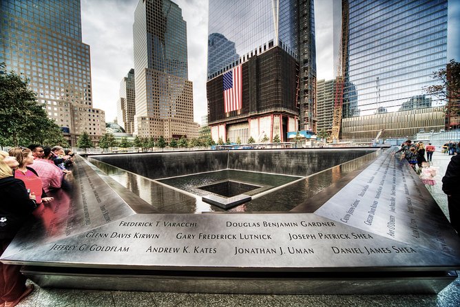 Lower Manhattan & 9/11 Memorial Exclusive Guided Walking Tour - Wall Street Icons: Charging Bull, NYSE Exterior, and Fearless Girl
