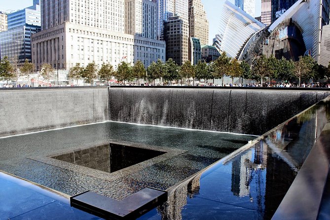Manhattan Group Tour Including Wall Street and 911 Memorial - Battery Park rituals: Canyon of Heroes, Charging Bull, and ticker-tape lore