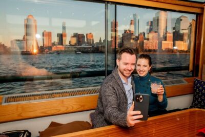 New York City Christmas Holiday Statue and Skyline Cocoa Cruise - The Harbor Route: Financial District Views to Ellis Island