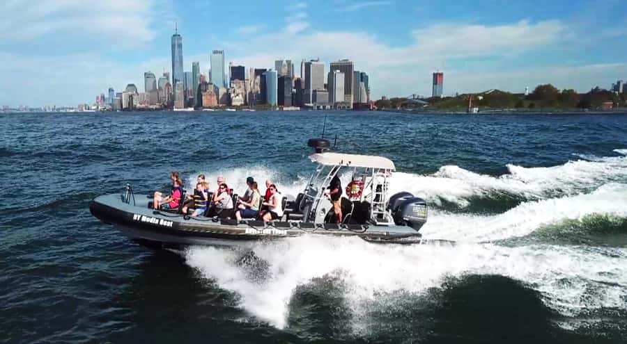 New York City: Harbor Speedboat Tour - Battery Park to the East River: Seaport views, helicopters, and bridge angles