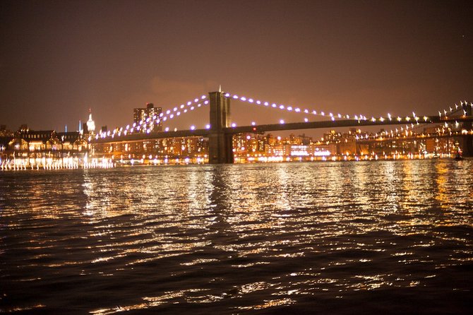 New York City Lights Cruise aboard Clipper City - Statue of Liberty at night: the main event up close
