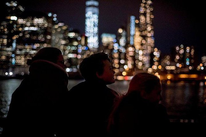New York City Skyline Lights Sail - Passing the Harbor Landmarks: Ellis Island and the Wider New York Harbor View