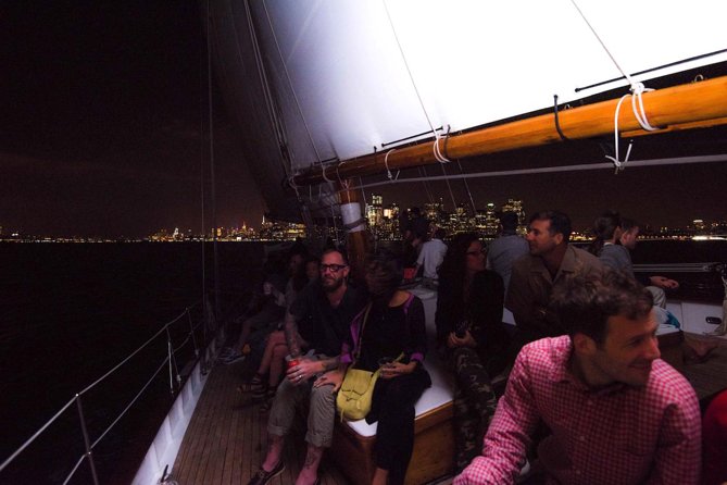 New York City Skyline Lights Sail - Statue of Liberty Lit Up at Night: The Moment That Pays Off