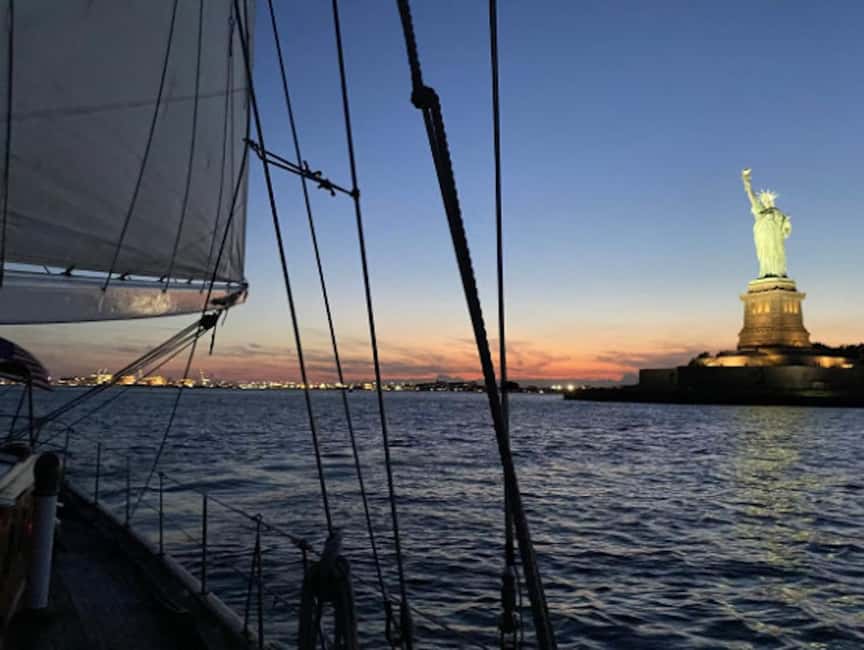 NYC: Clipper City Statue of Liberty City Lights Night Sail - Getting Hands-On: Helping Raise Sails and Steering at the Helm