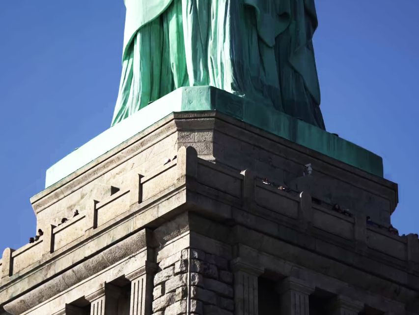 NYC: Ellis Island Private Tour with Liberty Island Access - Ferry to Liberty: what you should expect at security