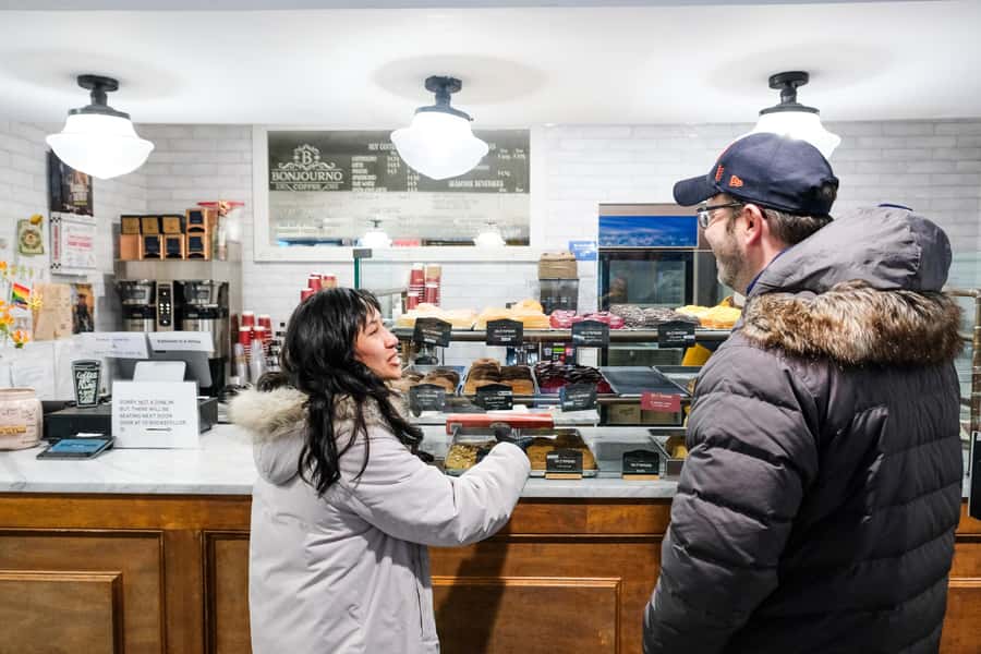 NYC: Guided Delicious Donut Tour with Tastings - Greenwich Village and the wall of donuts moment