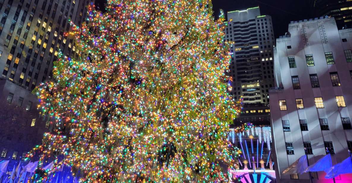NYC: Holiday Lights Guided Bus Tour - A quick optional bite near Little Italy Pizzeria and Deli