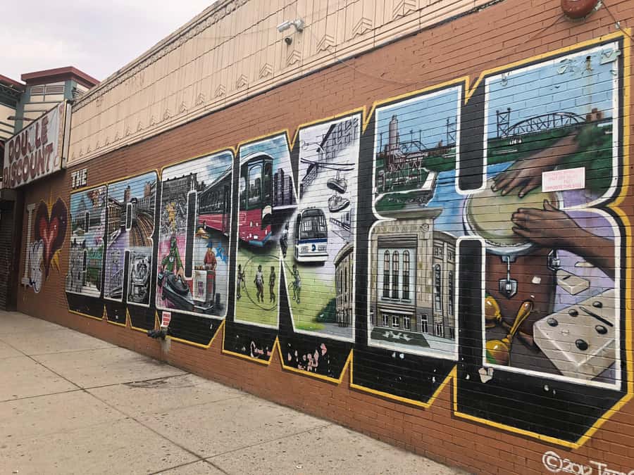 NYC: New York City Contrasts Tour through Harlem, The Bronx, Queens and Brooklyn - Queens: Malba contrast, Whitestone Bridge views, and Flushing Meadows stars