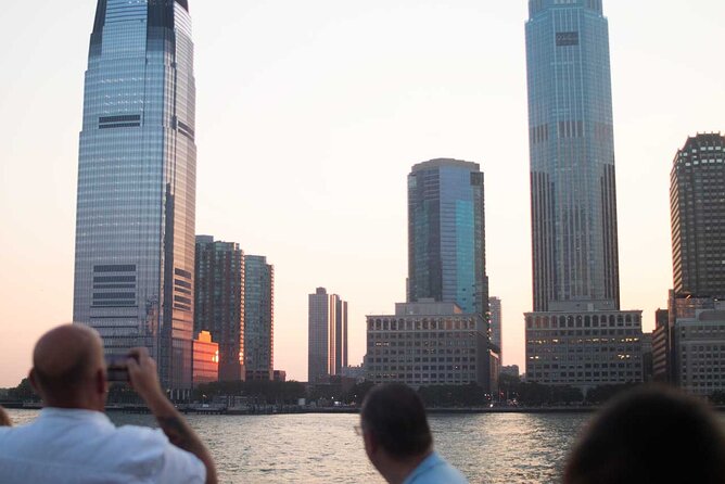 NYC Sunset Cruise Experience the City Twilight Magic - Battery Park, One World Trade Center, and the Bridge-Light Sequence