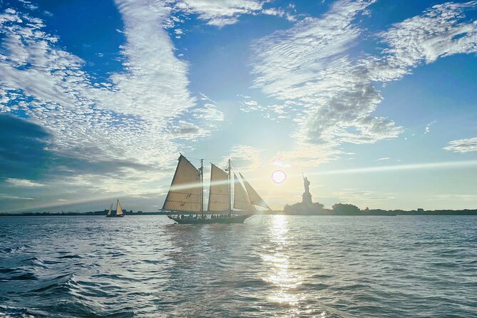 Private Statue of Liberty Sailing Tour - Boat comfort you can feel: deck lounge, sun pad, cabin seating, and a restroom