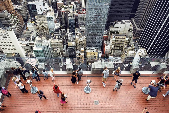 See 30 Top New York Sights (Walking Tour) & Visit Central Park Zoo. - Meeting Point: Wall Street Starts at Federal Hall