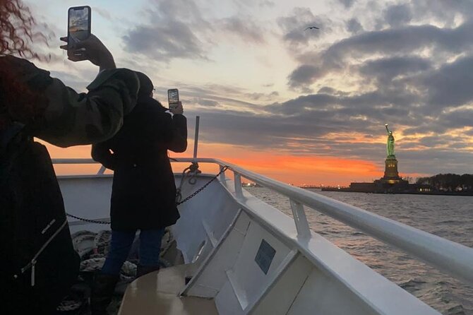 Statue of Liberty and Ellis Island Sunset Cruise in New York - Passing Under the Brooklyn Bridge: The Moment the City Feels Real