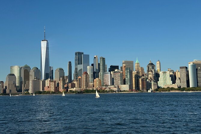 Statue of Liberty & Manhattan Skyline Cruise Near Times Square - Statue of Liberty and Ellis Island: The Signature Photos and the Human Story