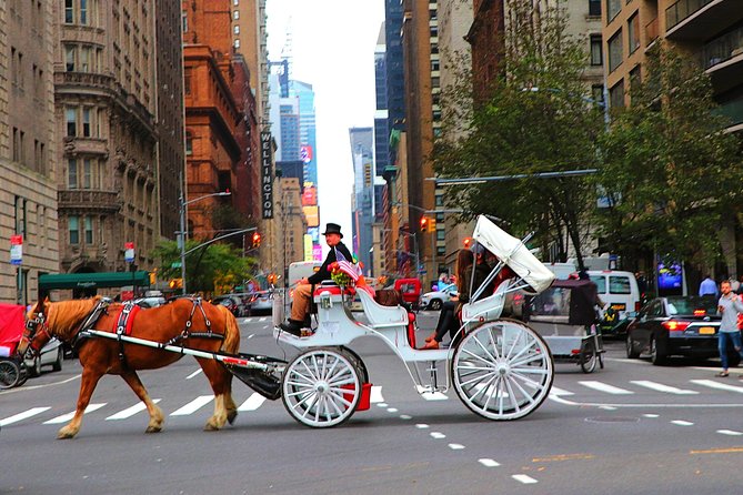 VIP Horse Carriage Ride through Central Park (Up to 4 Adults) - Mid-ride beauty: Bethesda Terrace, Strawberry Fields, and the bridges